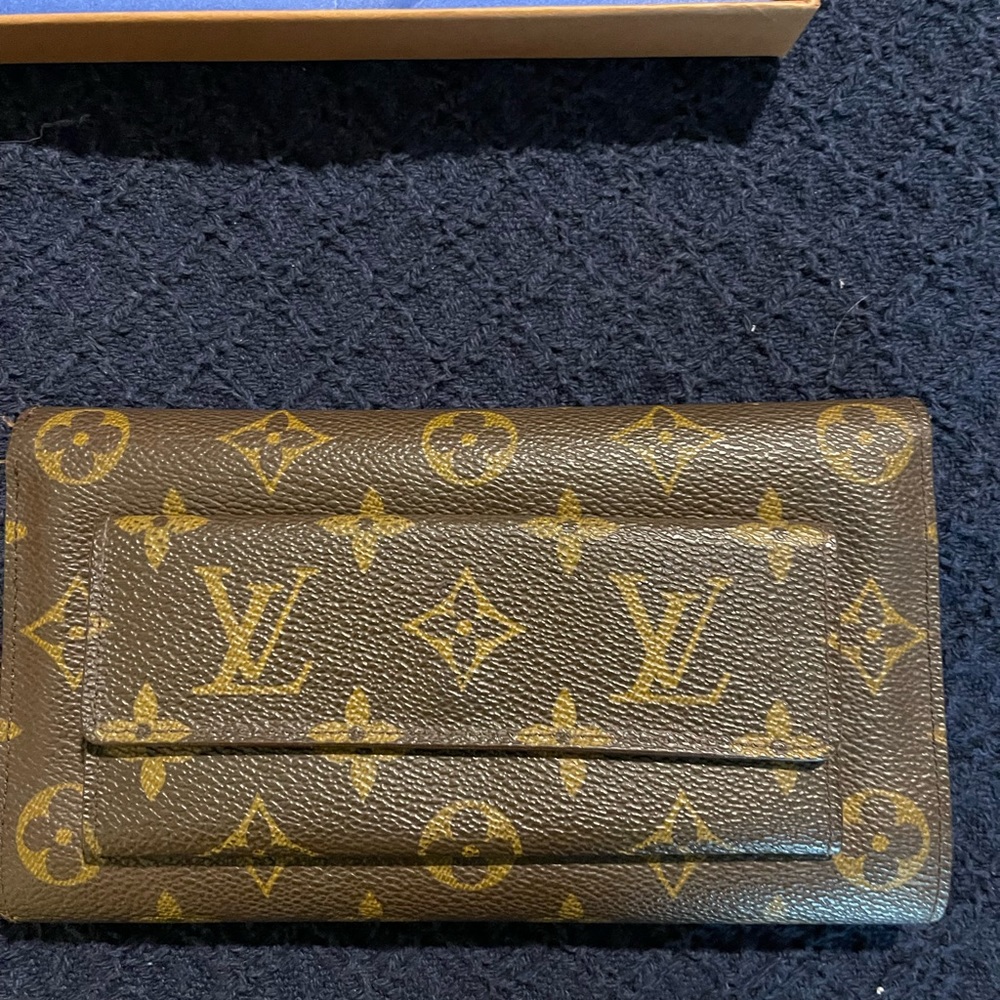 Louis Vuitton Tri Fold wallet with checkbook holder.